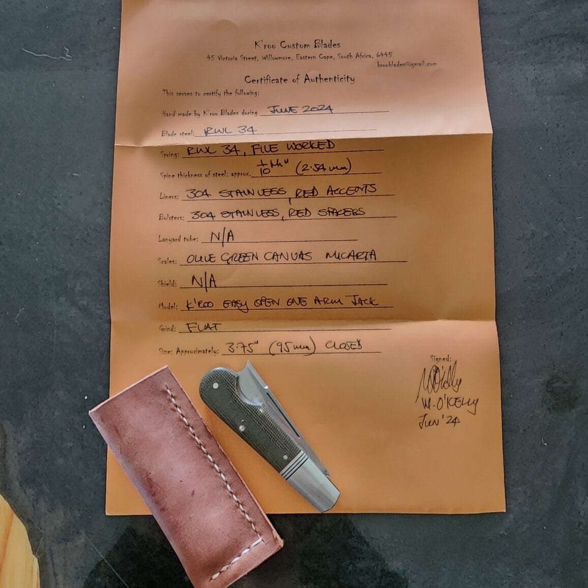 K'Roo Custom Easy Open One Arm Jack in Green Micarta Created June 2024 by W. O'Kelly – gallery image 2