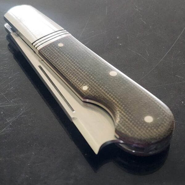 K'Roo Custom Easy Open One Arm Jack in Green Micarta Created June 2024 by W. O'Kelly – gallery image 1