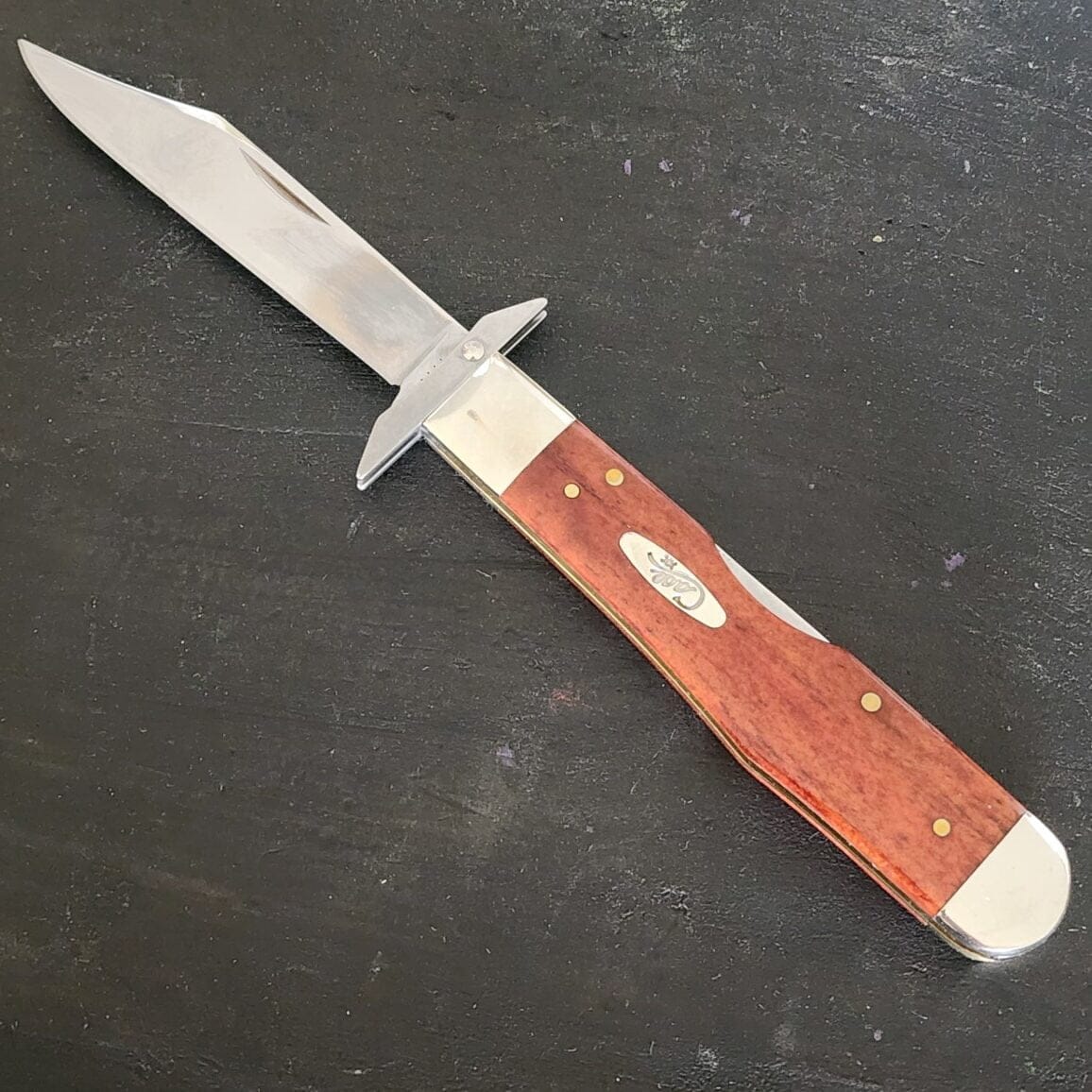 Case XX USA 6111 1/2 SS Chestnut Bone Smooth Cheetah For Sale