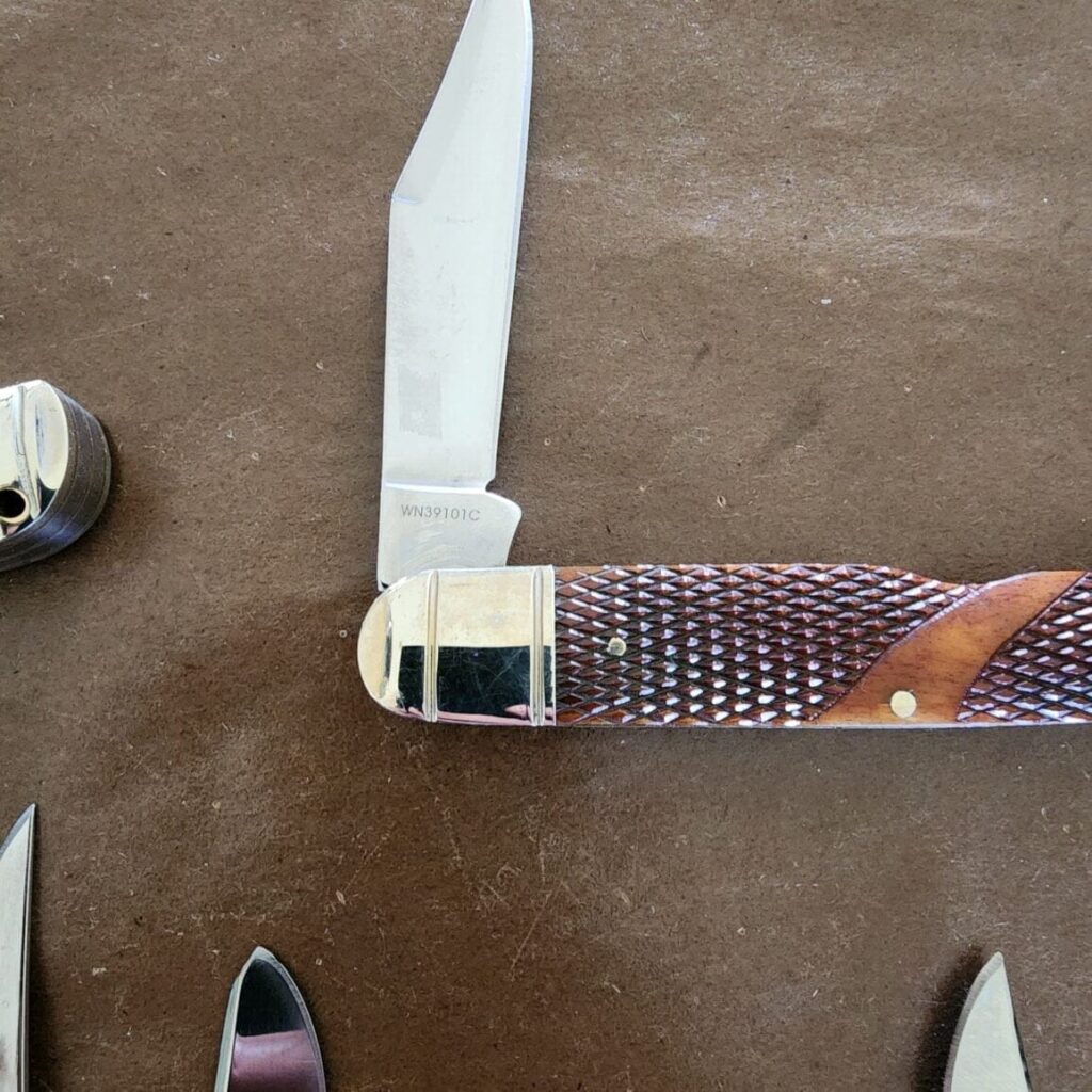 Limited Edition Winchester Collector's Edition Knife Set, Stainless steel blade with match strike pulls and brown checkered bone. (Set of 5) – gallery image 6