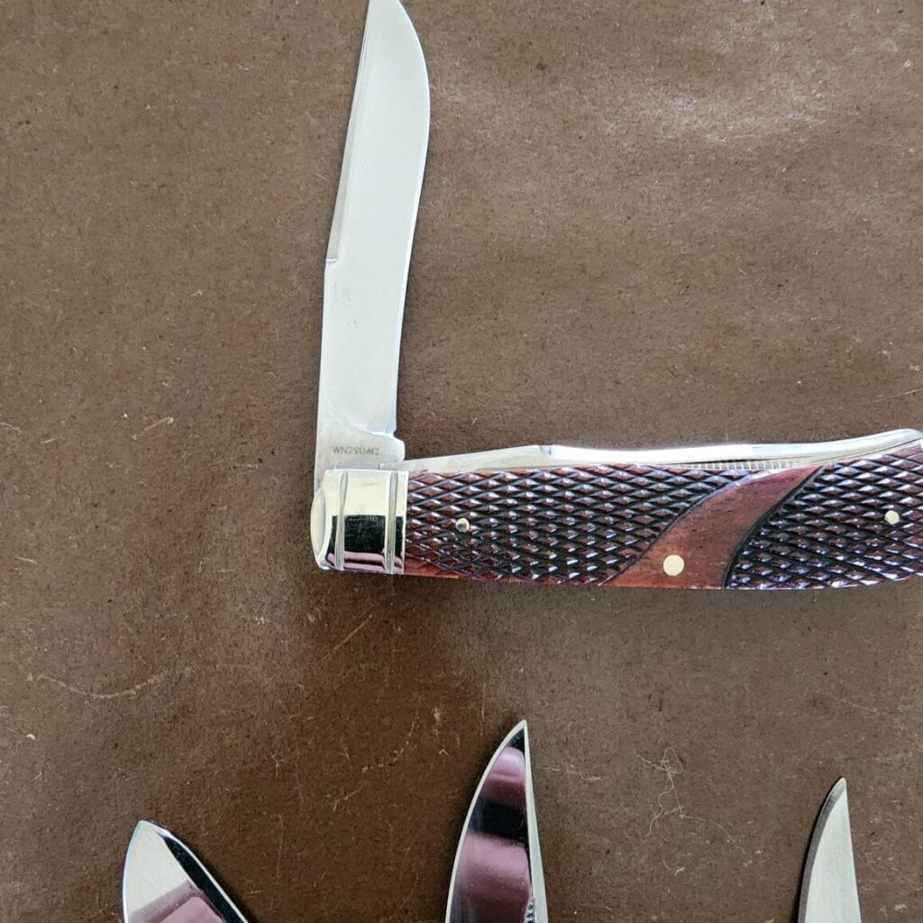 Limited Edition Winchester Collector's Edition Knife Set, Stainless steel blade with match strike pulls and brown checkered bone. (Set of 5) – gallery image 5