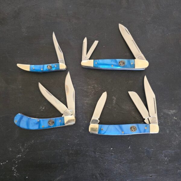 Crowing Rooster Blue Swirl Synthetic Set of 4 Slip Joint Knives – gallery image 1