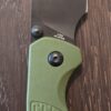 CJRB Cutlery Pyrite-Light Button Lock Folding Knife 3.34" AR-RPM9 Black Wharncliffe Blade, OD Green FRN Handles - J1945-BGN knife for sale