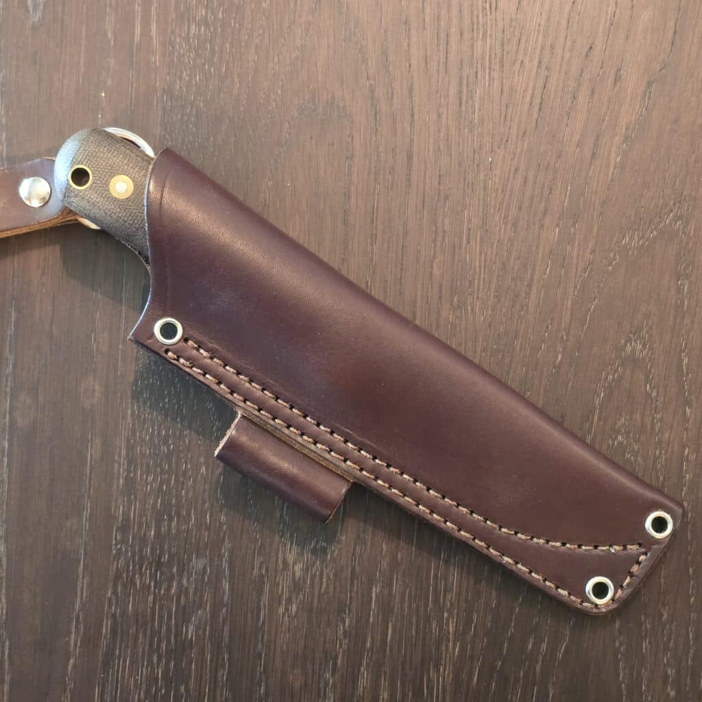L.T. Wright Handcrafted Knives fixed blade knife in Canvas Micarta and A2 drop point blade 10¼" OAL full tang with the lined lanyard hole and brown leather sheath with a belt loop – gallery image 2