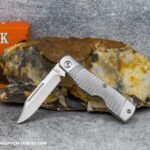 C. Risner Hot Brass Jack: Jigged Stainless Steel - Clip Point 154CM