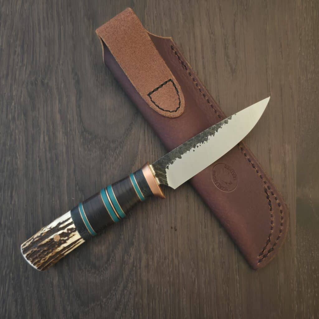Warlander Knives T & B in 80Crv2 and Copper, Sambar Stag, Black Canvas Hores Hide and Teal Fiber 11/2024 knife for sale
