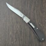 K'Roo Custom Back Pocket Trapper in Cape Buffalo Horn and N690 with Rounded Bar Shield Created November 2025 by W. O'Kelly knife for sale