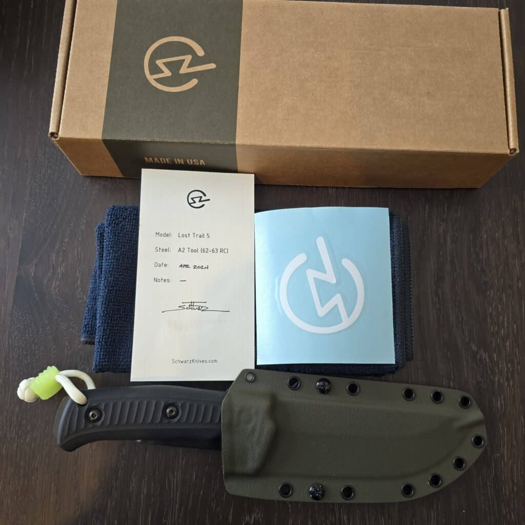 Schwarz Knives Lost Trail 5 in A2, OD Green Cerakote,Black Richlite Handles, OD Green Kydex and JWR Gear Curator Flex Glow Bead knife for sale
