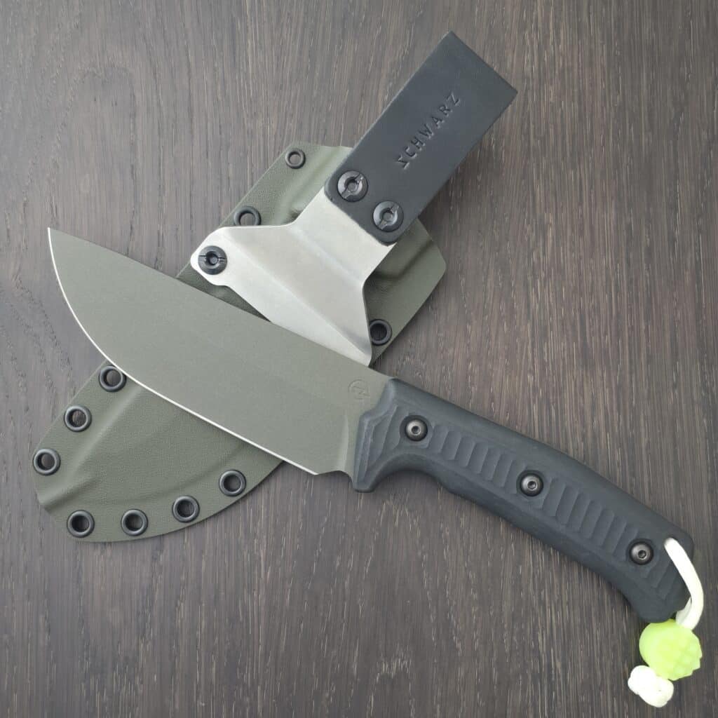 Schwarz Knives Lost Trail 5 in A2, OD Green Cerakote,Black Richlite Handles, OD Green Kydex and JWR Gear Curator Flex Glow Bead knife for sale