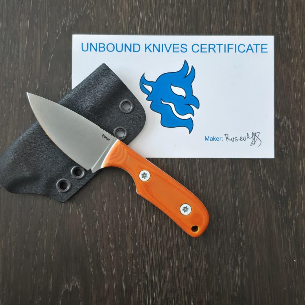 Unbound Knives/ Nikola Rusev Modified Cargo Model in Elmax 62 HRC Cryo and Orange Micarta Scales with White G10 Liners and White Gulso Hardware knife for sale