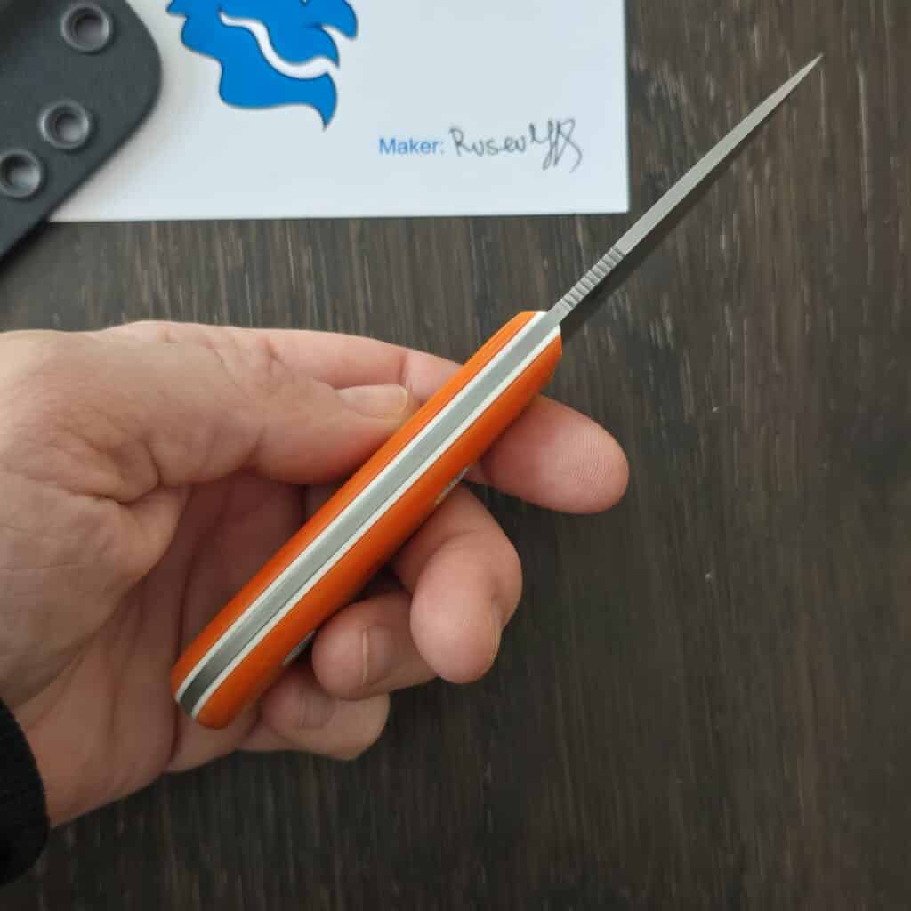 Unbound Knives/ Nikola Rusev Modified Cargo Model in Elmax 62 HRC Cryo and Orange Micarta Scales with White G10 Liners and White Gulso Hardware knife for sale