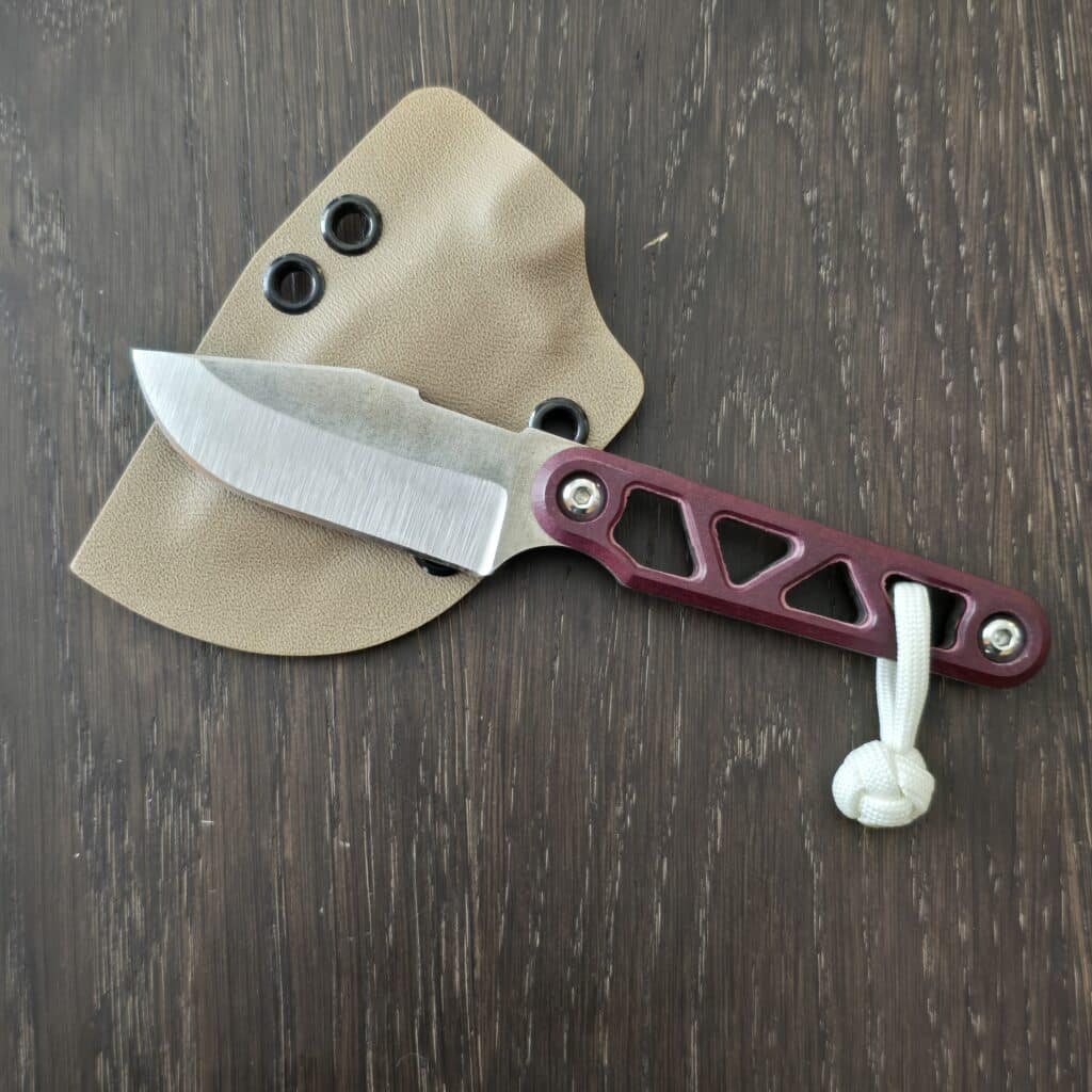 August Originals Arcade Fixed Blade in Magnacut and Maroon Richlite Handles, FDE Kydex and Glow Cord Knot – gallery image 3