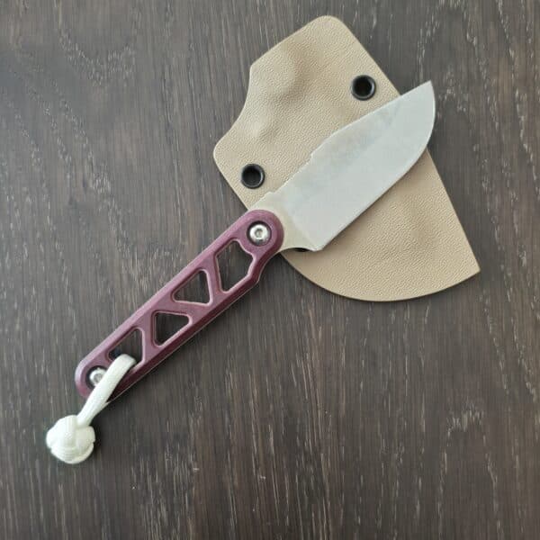 August Originals Arcade Fixed Blade in Magnacut and Maroon Richlite Handles, FDE Kydex and Glow Cord Knot – gallery image 1