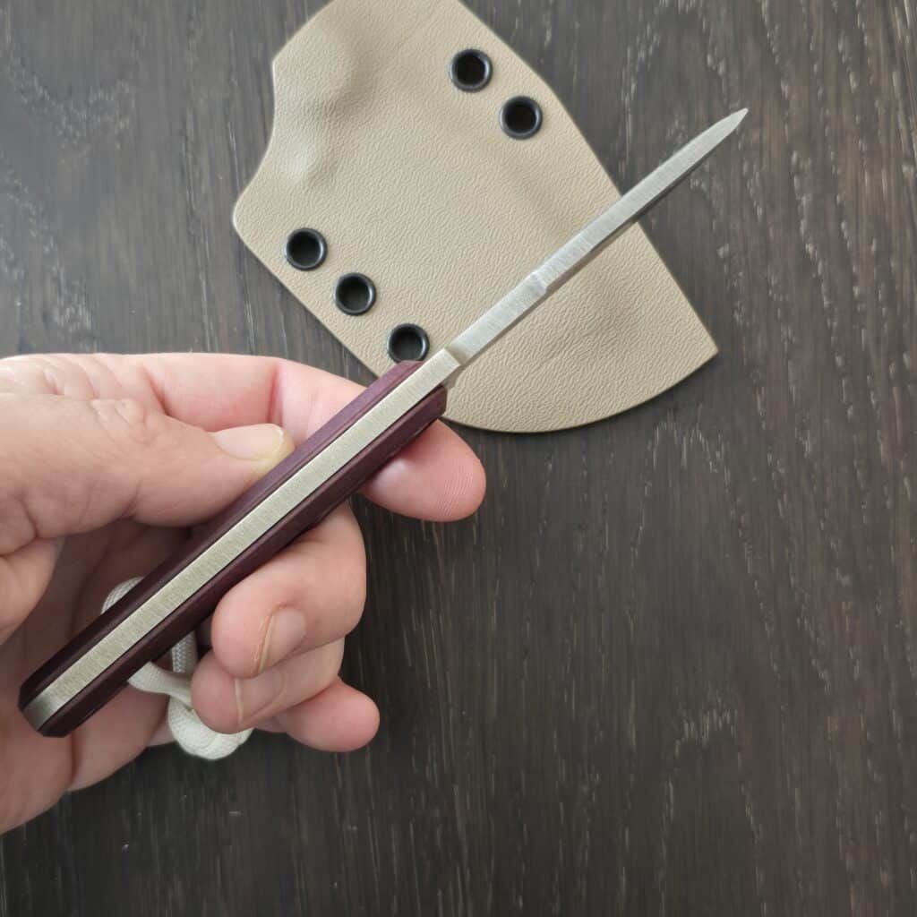 August Originals Arcade Fixed Blade in Magnacut and Maroon Richlite Handles, FDE Kydex and Glow Cord Knot – gallery image 2