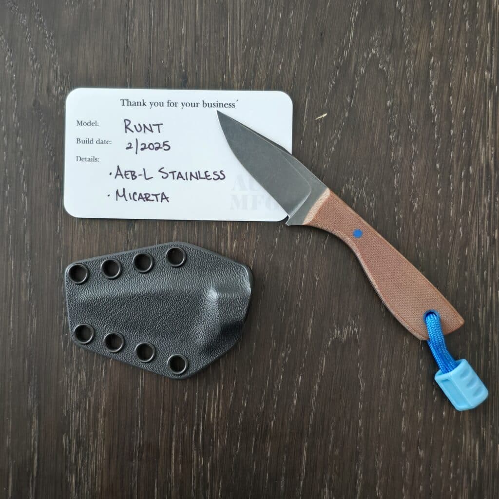 Auxiliary Manufacturing Runt in ABE-L and Natural Micarta With Blue G10 Pin and Blue Glow Insurgent Bead By Combat Beads – gallery image 3