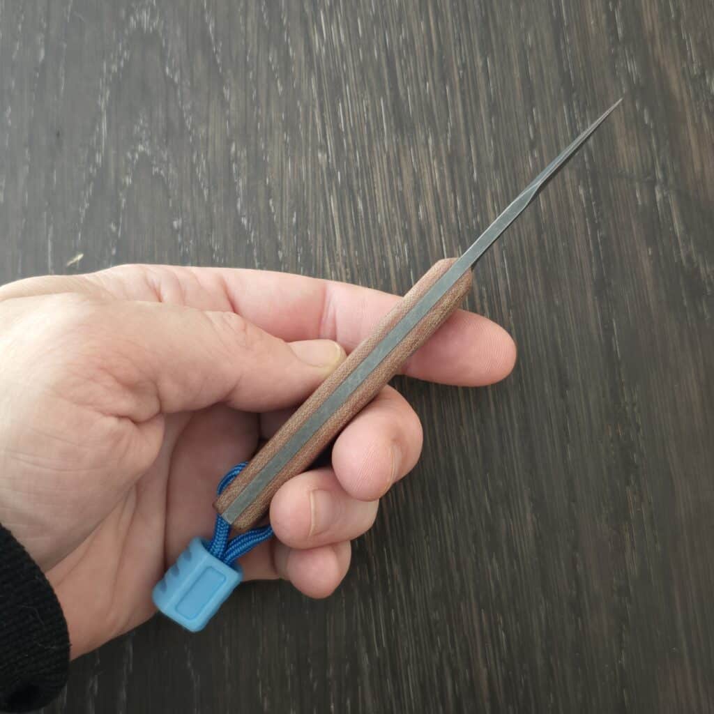 Auxiliary Manufacturing Runt in ABE-L and Natural Micarta With Blue G10 Pin and Blue Glow Insurgent Bead By Combat Beads – gallery image 2