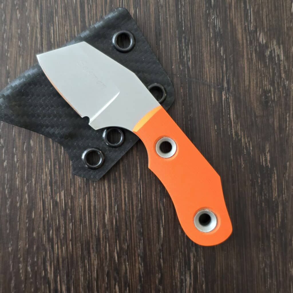 Sakman Steenkamp Custom EDC in N690 and Orange G10 with Faired Stainless Tubes and Custom Carbon Fiber Kydex Sheath By Armatus knife for sale