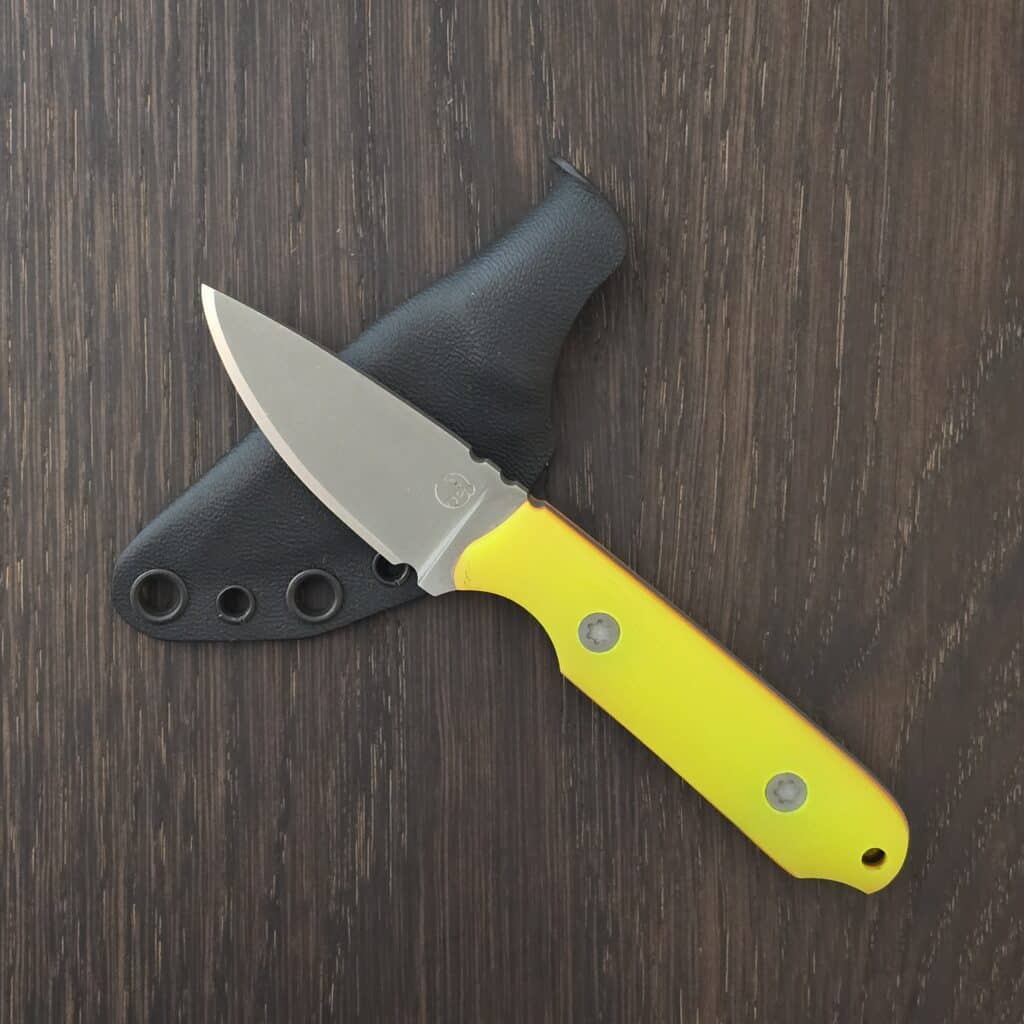 Brian Berard/ Clavius Knives Thebit in 154CM and Dayglow G10 Handles with Orange G10 Liners and Black Kydex Sheath knife for sale