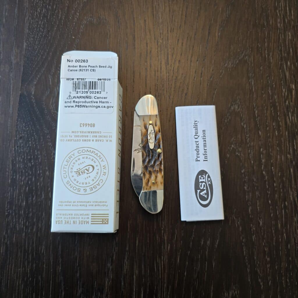 Case XX USA Amber Peach Seed Jigged Bone Canoe 62131 CS No 00263 knife for sale