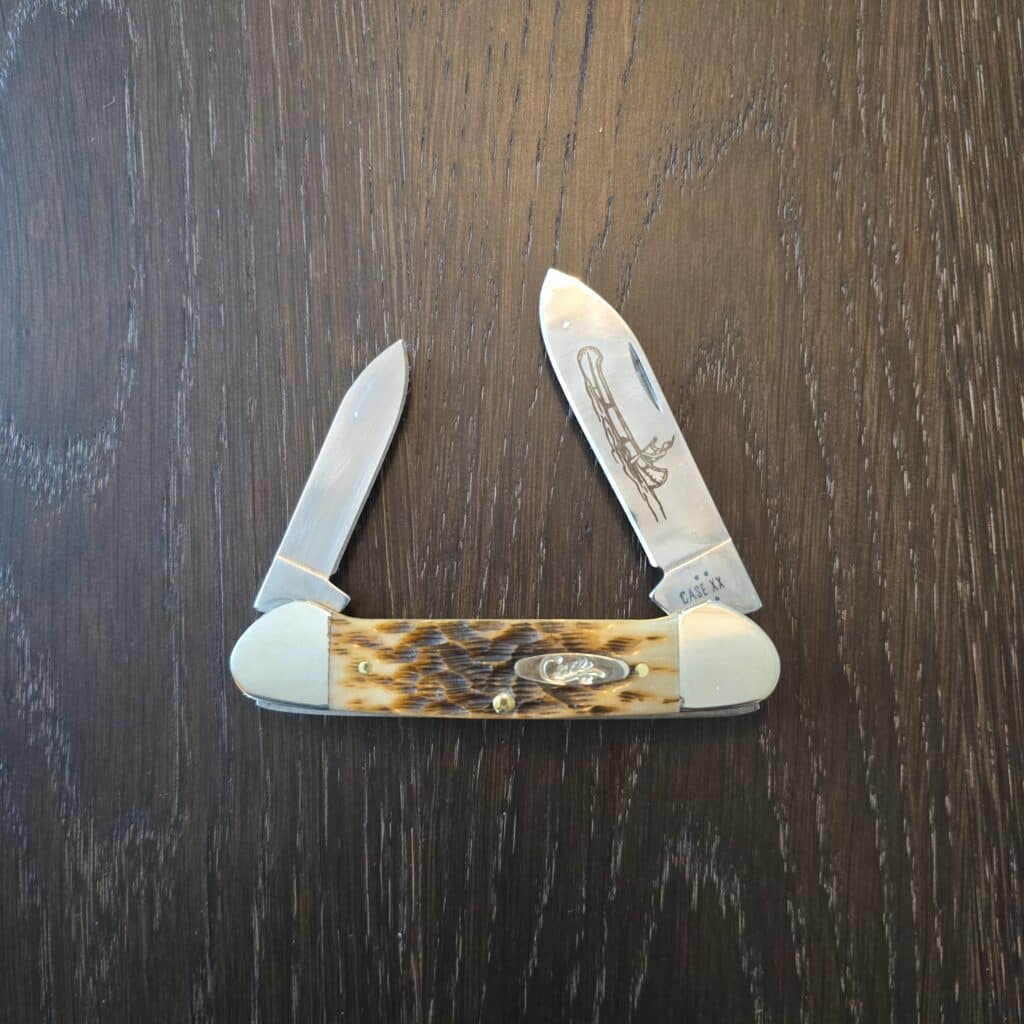Case XX USA Amber Peach Seed Jigged Bone Canoe 62131 CS No 00263 knife for sale