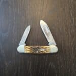 Case XX USA Amber Peach Seed Jigged Bone Canoe 62131 CS No 00263 knife for sale