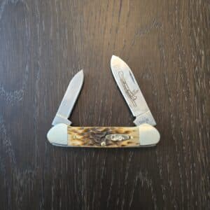 Case XX USA Amber Peach Seed Jigged Bone Canoe 62131 CS No 00263 knife for sale
