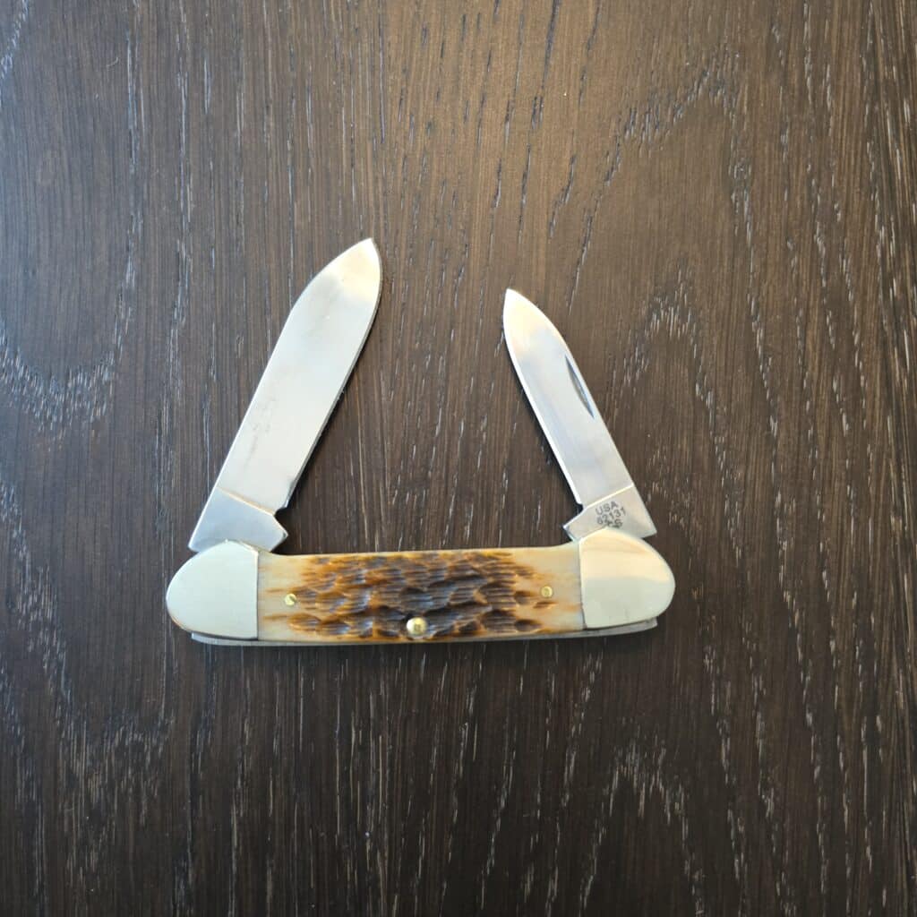 Case XX USA Amber Peach Seed Jigged Bone Canoe 62131 CS No 00263 knife for sale