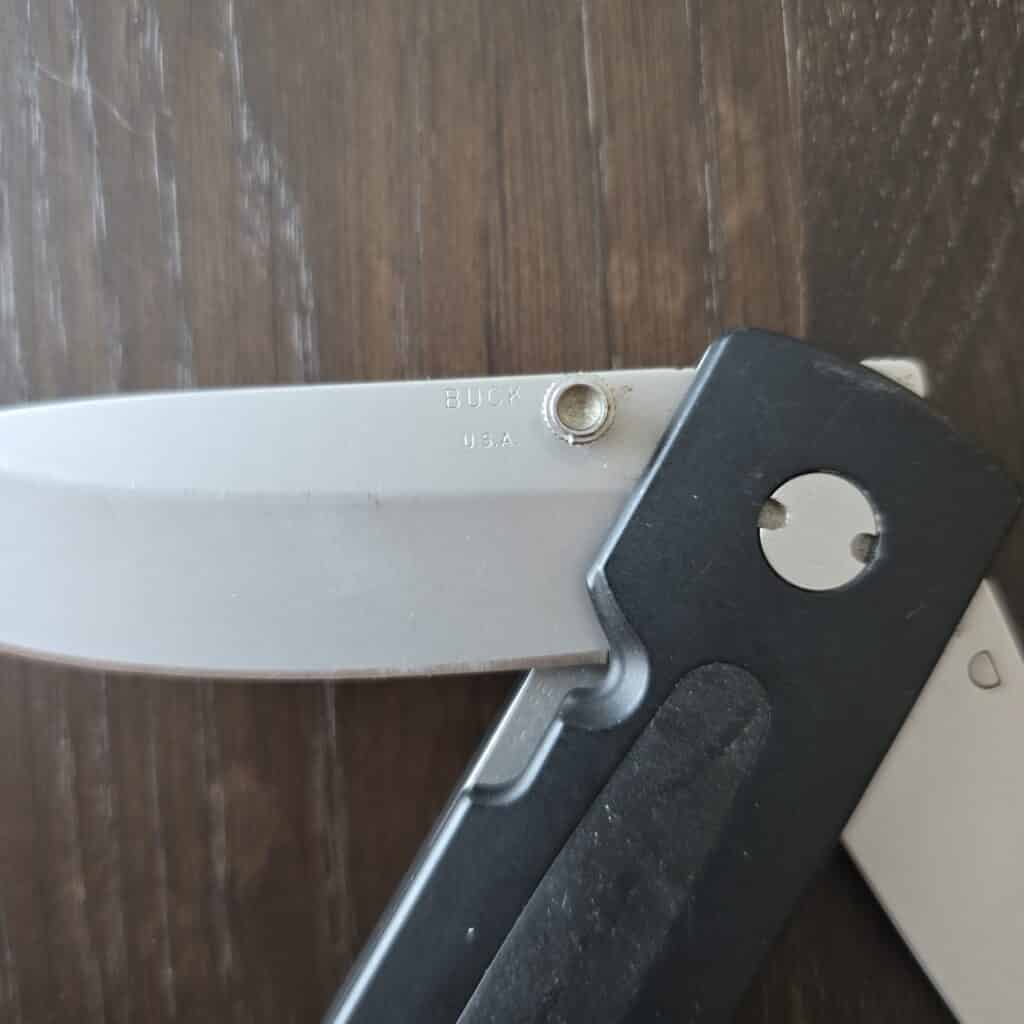 Buck USA model 180 cross lock stainless drop point main blade and gut hook/cord cutter secondary blade both blades lock using a liner lock (USED) – gallery image 3