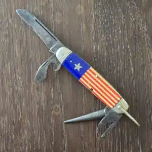 Remington USA Vintage Scout R 3335 with Flag Pyremite scales (see images for condition) knife for sale
