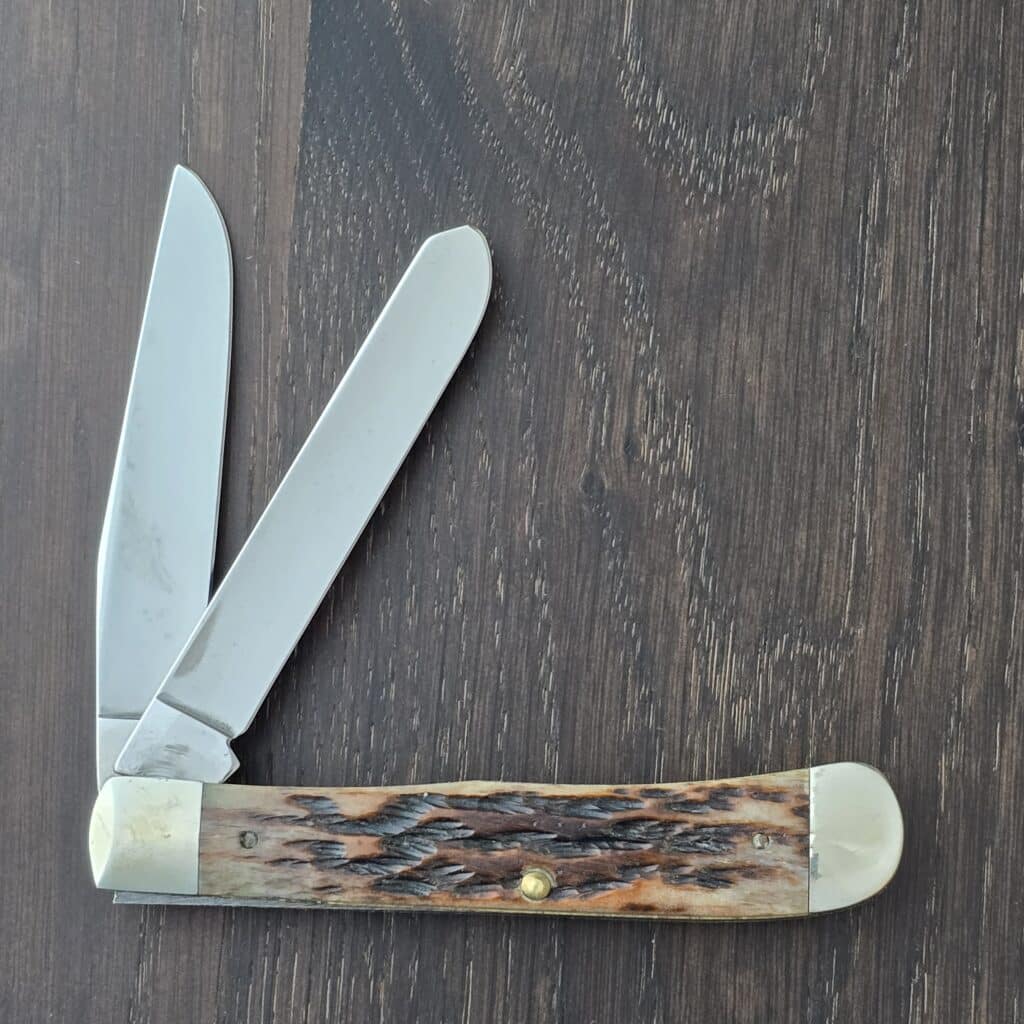 Case USA 1993 Brown Jigged Bone PS #6254 SS Large Trapper 7 dots Ser #015/100 "Get Real Bill" Embossed on Clip Blade knife for sale