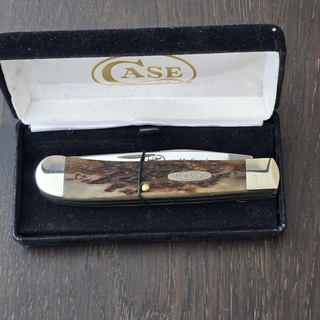 Case USA 1993 Brown Jigged Bone PS #6254 SS Large Trapper 7 dots Ser #015/100 "Get Real Bill" Embossed on Clip Blade knife for sale