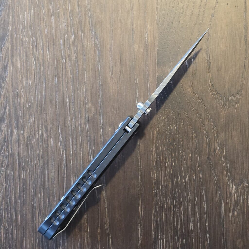 Defiant-7 Talos Button Lock with Black Boomerang Stainless Chad Nichols Damascus Blade and Black Hardcoat Anodized Aluminum Handles USA knife for sale