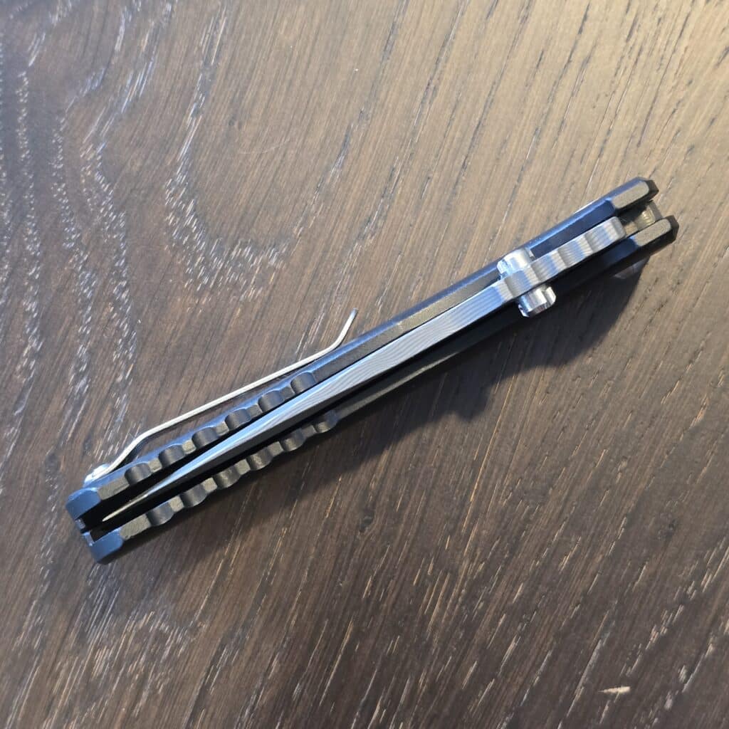 Defiant-7 Talos Button Lock with Black Boomerang Stainless Chad Nichols Damascus Blade and Black Hardcoat Anodized Aluminum Handles USA knife for sale