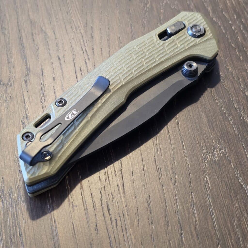 Zero Tolerance ZT 0203 USA in Olive Green G 10 and CPM M4 Ser.1192 (gently used) knife for sale