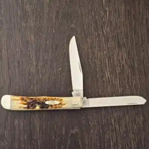 Case XX USA No. 06540 Amber Bone Peach Seed Jig Trapper w/ Clip 6254C SS knife for sale