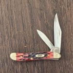 Case XX USA No. 27384 Chrimson Red Bone Peach Seed Jigged Peanut 6220 SS knife for sale