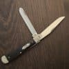 Case XX USA No 59670 Worked Bolster Ebony Wood Smooth Trapper 7254 SS