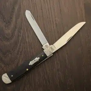 Case XX USA No 59670 Worked Bolster Ebony Wood Smooth Trapper 7254 SS