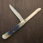 Case XX USA No 61801 Burnt Purple Tribal Jigged Bone Trapper 6254 SS