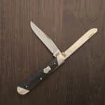 Case XX USA No 32450 Slant Bolster Ebony Wood Smooth Trapper 7254 SS