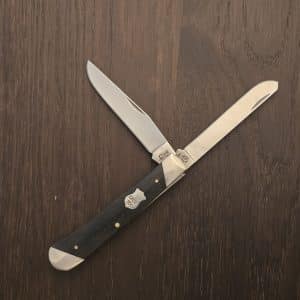 Case XX USA No 32450 Slant Bolster Ebony Wood Smooth Trapper 7254 SS