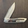 Sharp By Design Typhoon 10 in M390 and Titanium with Textured Lava Flow Kirinite Inlay