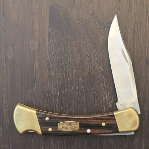 Buck USA 50 Year Anniversary 110 Lockback in Ebony and Stainless Steel